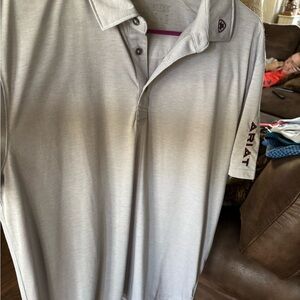 Ariat Men's Gray Polo Shirt. 

Never worn. In mint condition